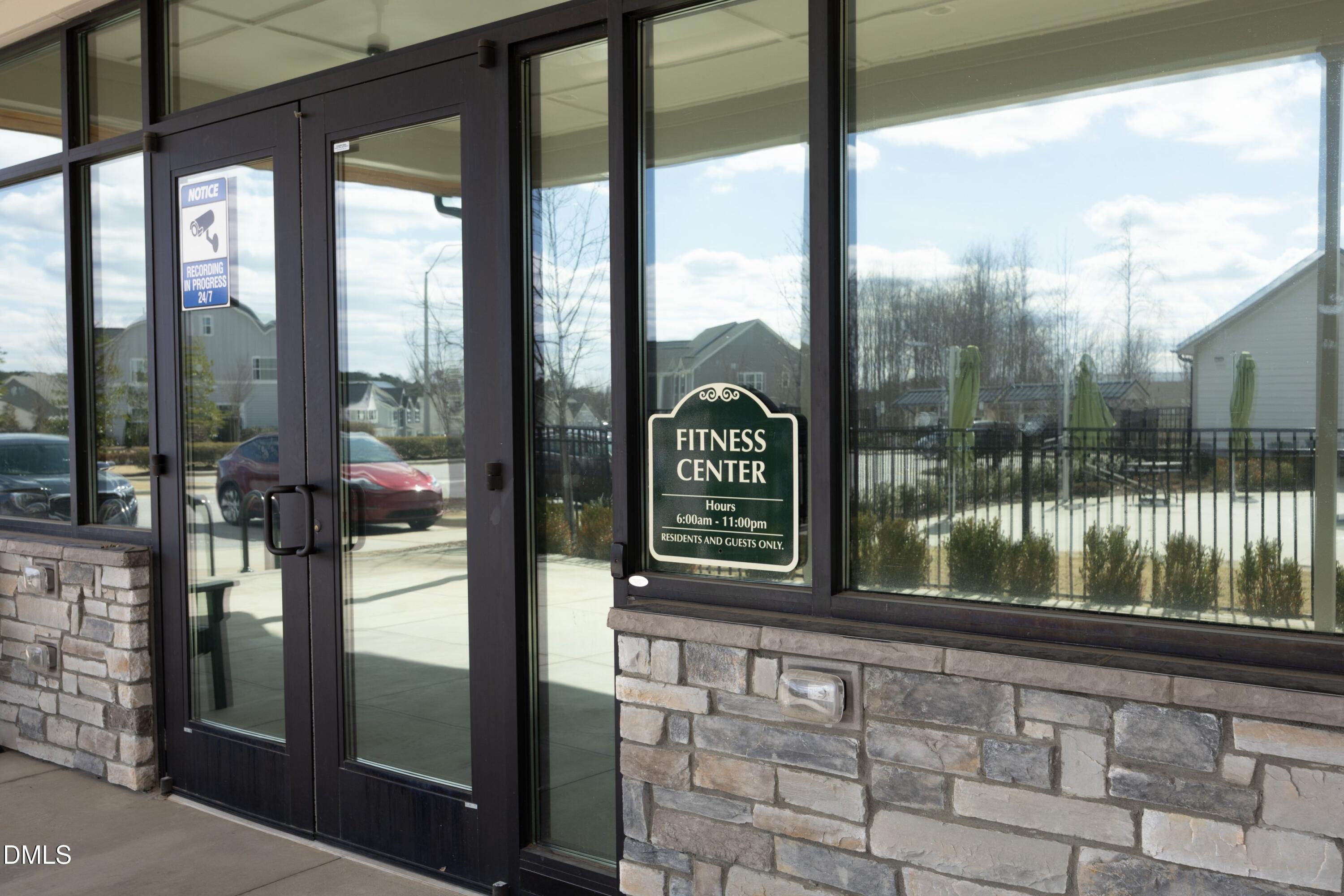 500 Ressler Street Holly Springs, NC 27540 - Photo 32 of 37 a porch with a glass door