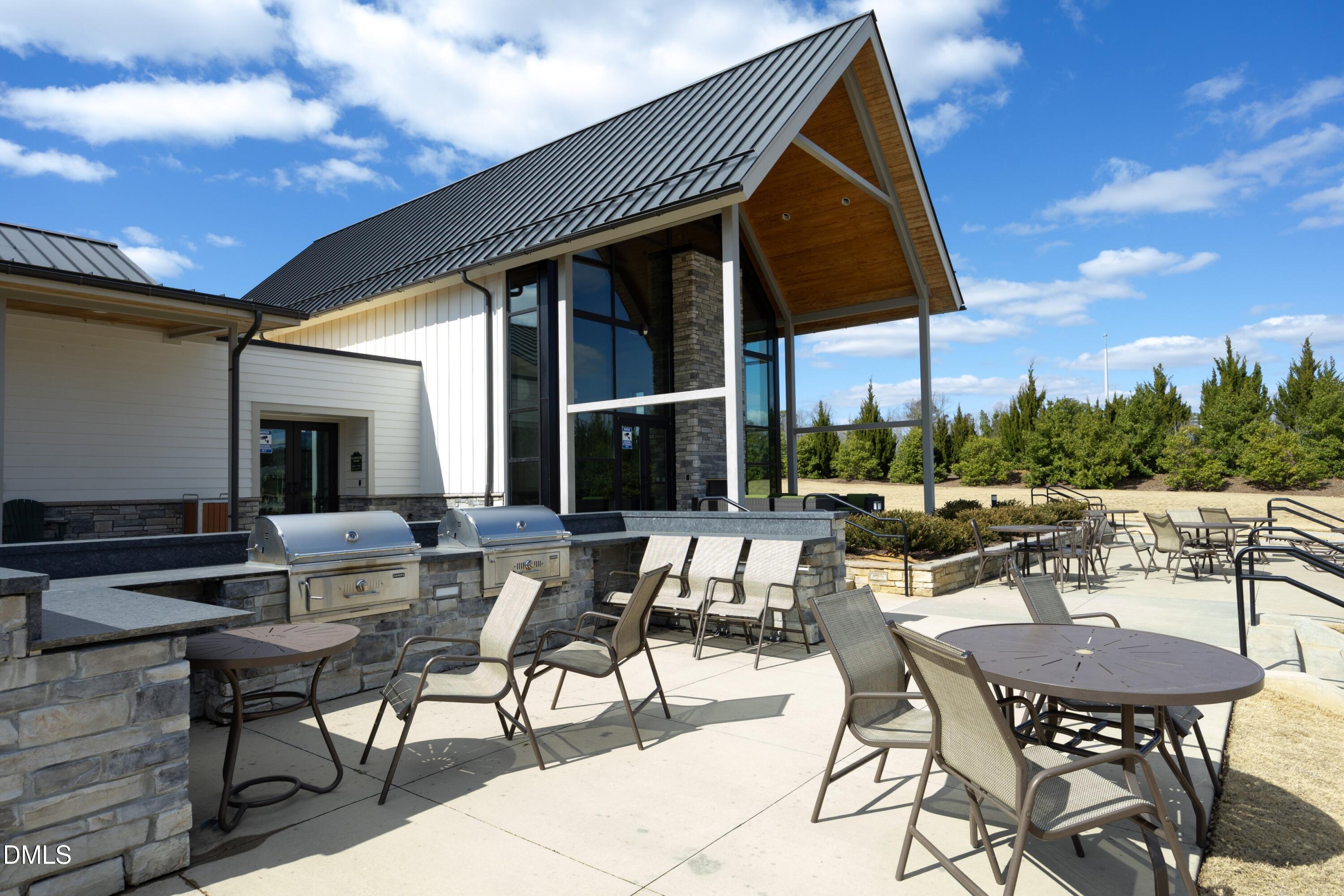 500 Ressler Street Holly Springs, NC 27540 - Photo 33 of 37 a view of an outdoor space with furniture and garden view