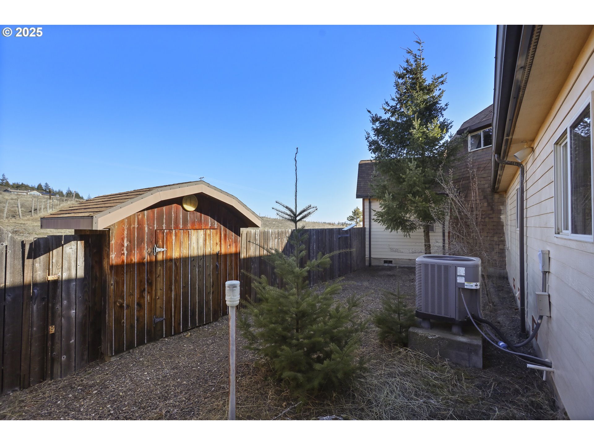 401 Johnson Road Lyle, WA 98635 - Photo 24 of 48 a view of a house with a yard