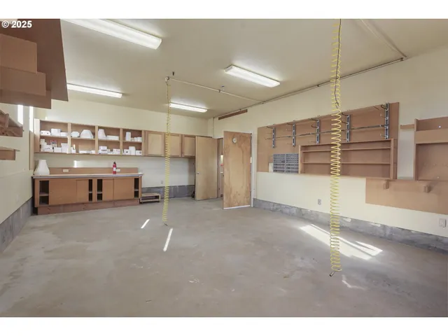 a view of a kitchen with furniture and a kitchen