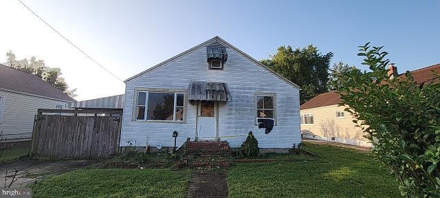 217 South Woodwell Road Dundalk, MD 21222 - Photo 1 of 49 a front view of house with a garden
