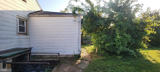 217 South Woodwell Road Dundalk, MD 21222 - Photo 20 of 49 a view of backyard of house and trees