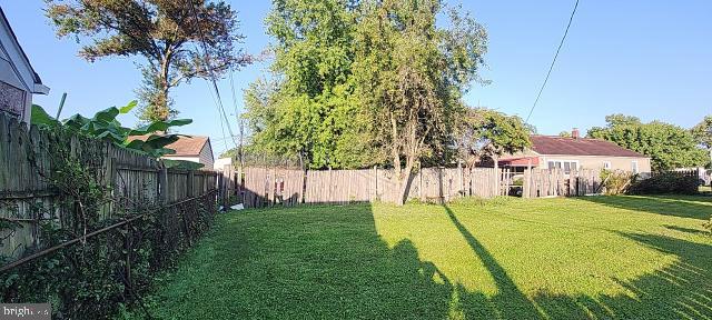 217 South Woodwell Road Dundalk, MD 21222 - Photo 26 of 49 a view of a house with a yard and plants