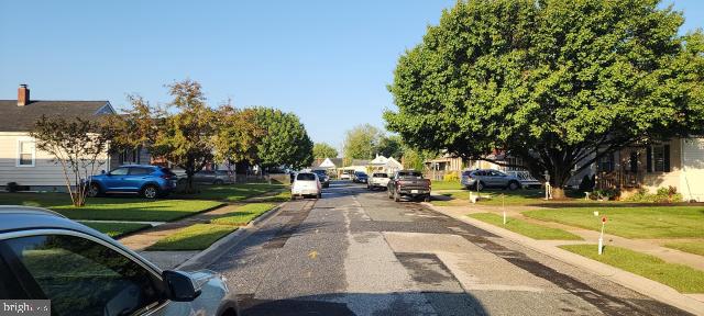 217 South Woodwell Road Dundalk, MD 21222 - Photo 3 of 49 a view of a swimming pool with lounge chairs in patio