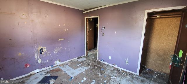 217 South Woodwell Road Dundalk, MD 21222 - Photo 35 of 49 an empty room with painted walls
