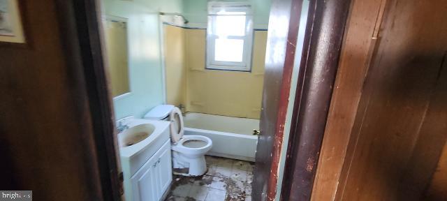 217 South Woodwell Road Dundalk, MD 21222 - Photo 38 of 49 a bathroom with a toilet and a shower