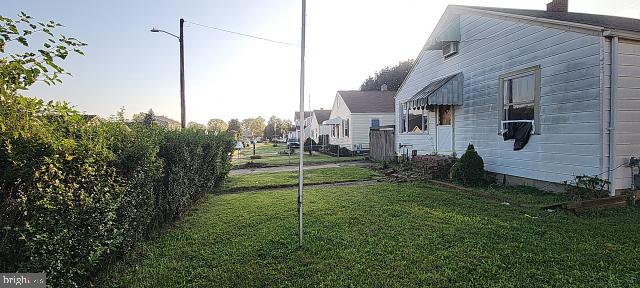 217 South Woodwell Road Dundalk, MD 21222 - Photo 7 of 49 a view of a house with a backyard