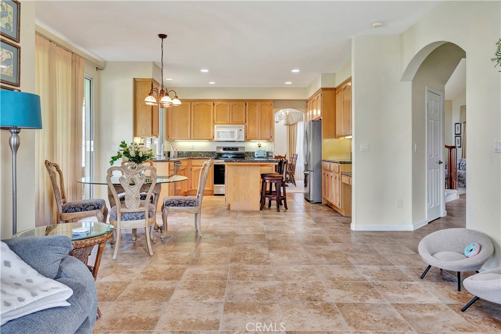 2104 Summit Drive Paso Robles, CA 93446 - Photo 13 of 31 a living room with furniture a window and a chandelier