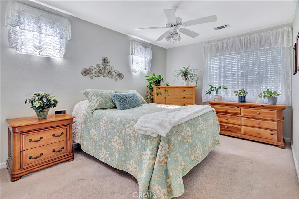 2104 Summit Drive Paso Robles, CA 93446 - Photo 30 of 31 a bedroom with a bed and a dresser