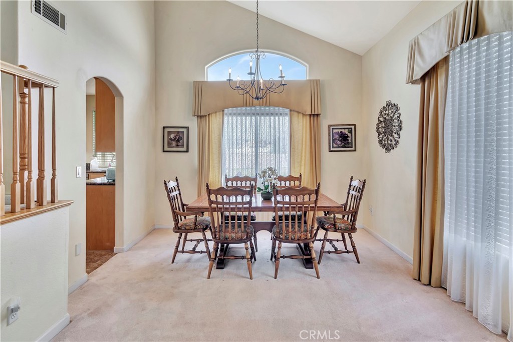 2104 Summit Drive Paso Robles, CA 93446 - Photo 9 of 31 a view of a dining room with furniture and chandelier