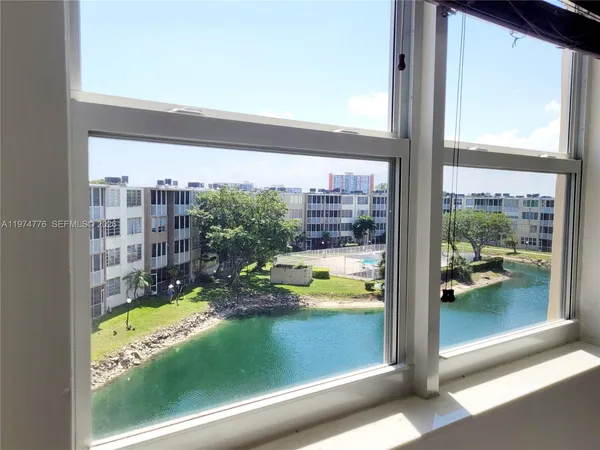 a view of swimming pool from a window
