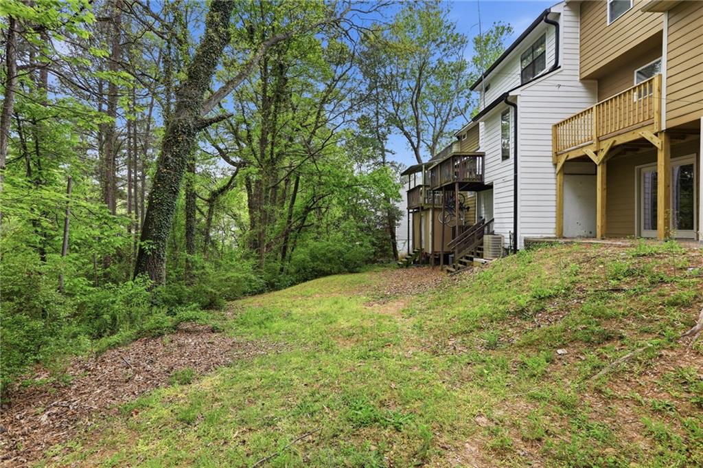 6981 Flagstone Drive Austell, GA 30168 - Photo 29 of 34 a view of a house with backyard and garden