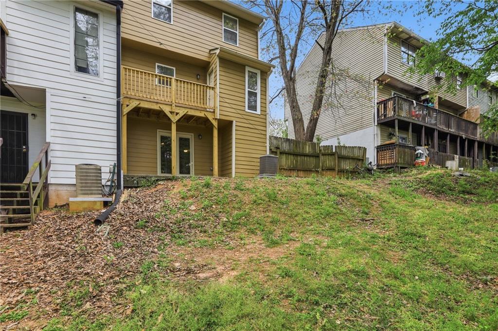 6981 Flagstone Drive Austell, GA 30168 - Photo 31 of 34 a view of a house with a yard and sitting area