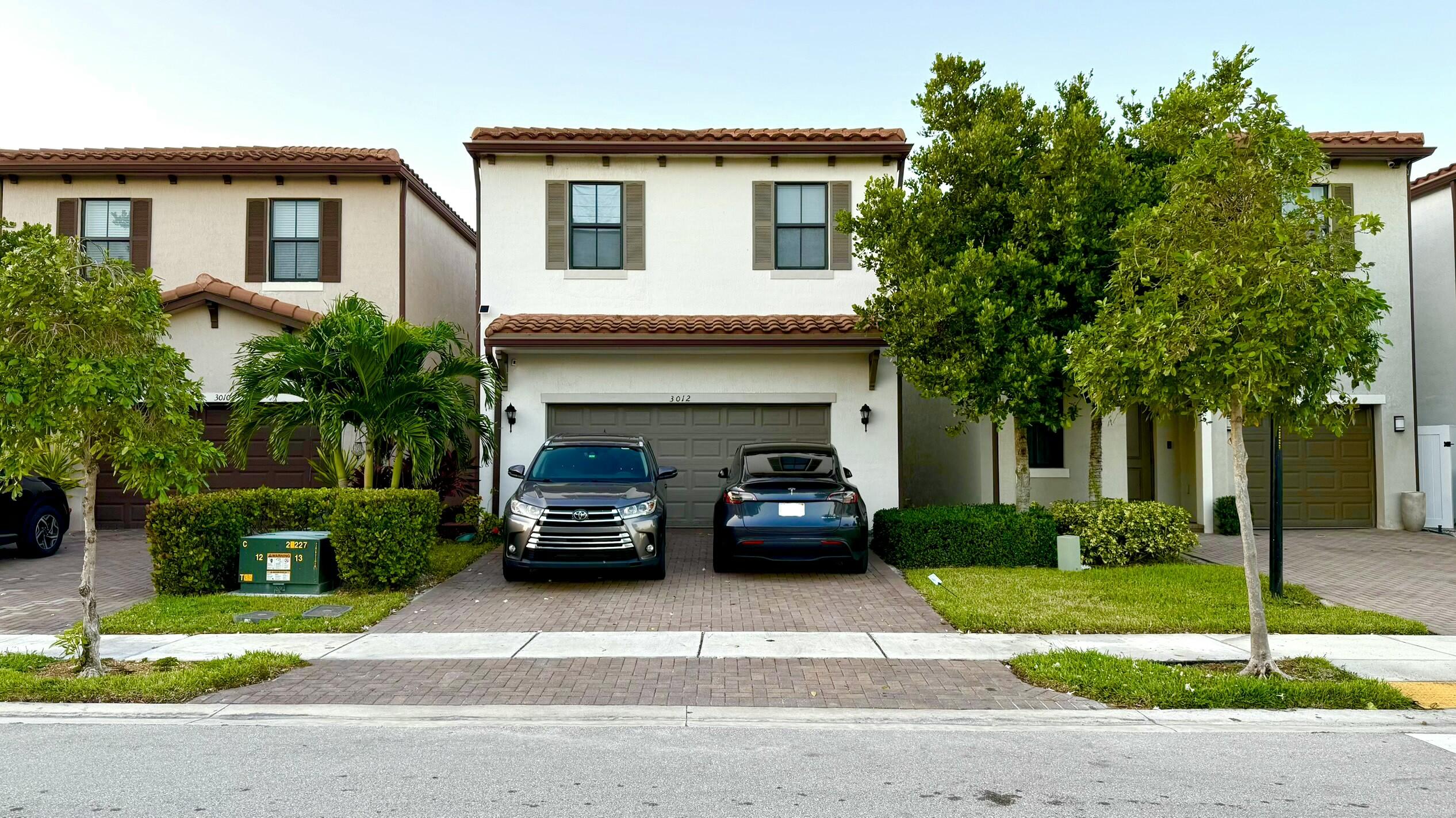 3012 King Palm Way Riviera Beach, FL 33410 - Photo 2 of 59 .