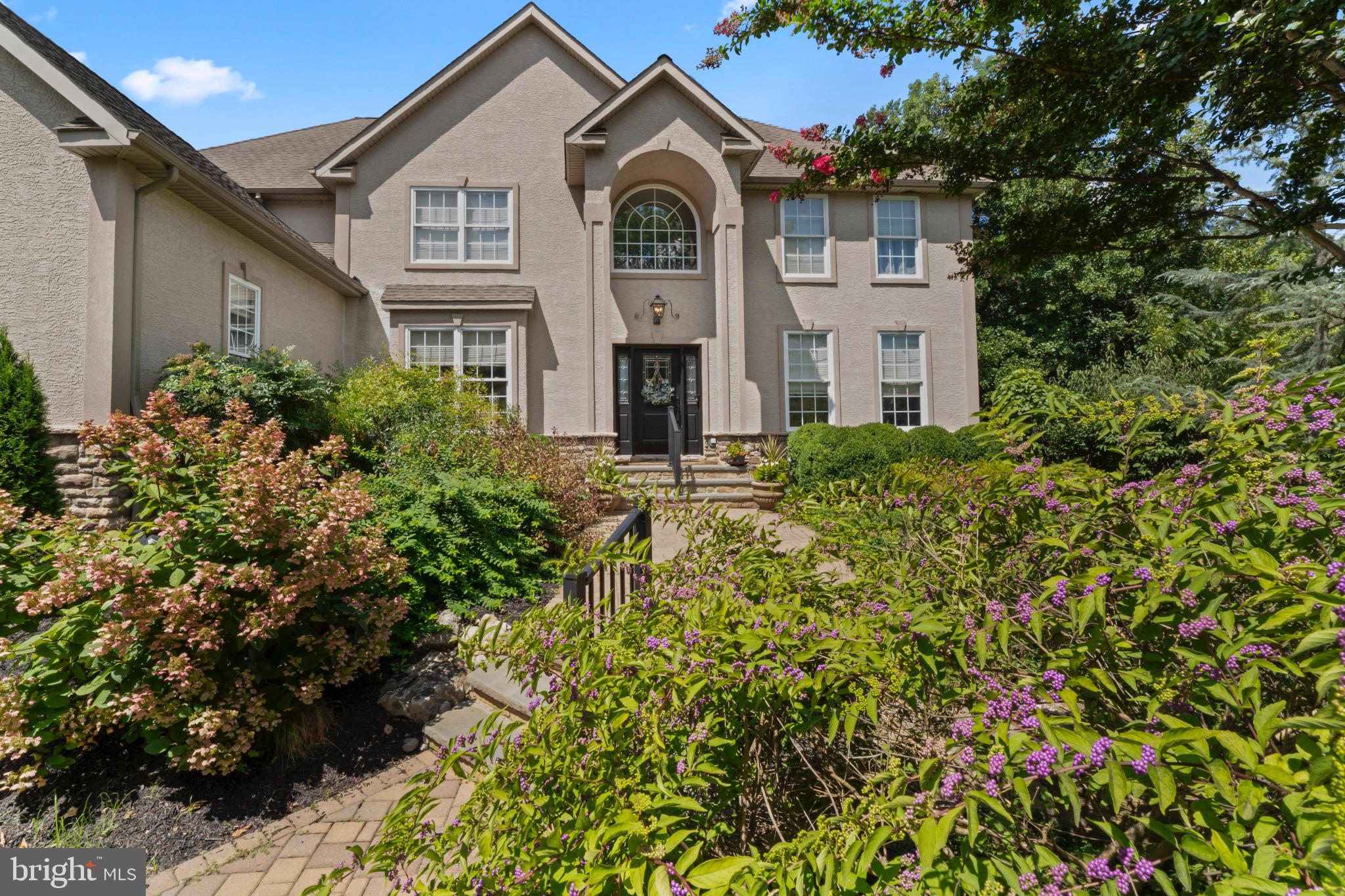 23 Regal's Court Swedesboro, NJ 08085 - Photo 2 of 74 a front view of a house with a garden