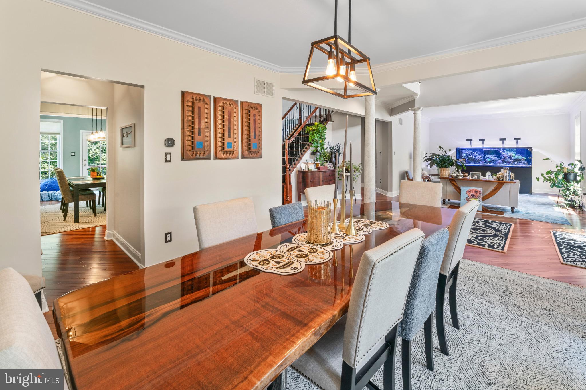 23 Regal's Court Swedesboro, NJ 08085 - Photo 23 of 74 a dining room with furniture a chandelier and wooden floor