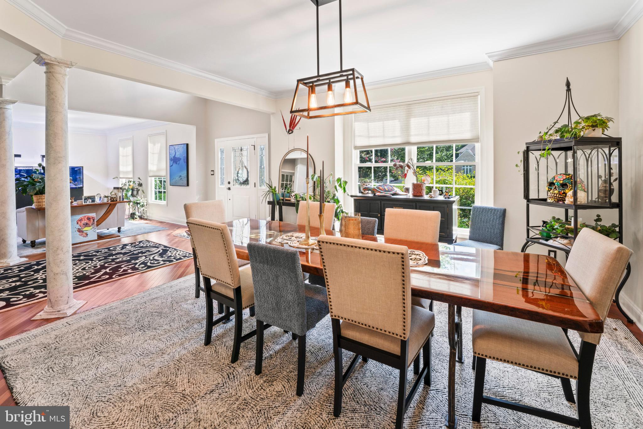 23 Regal's Court Swedesboro, NJ 08085 - Photo 24 of 74 a dining room with furniture a chandelier and wooden floor