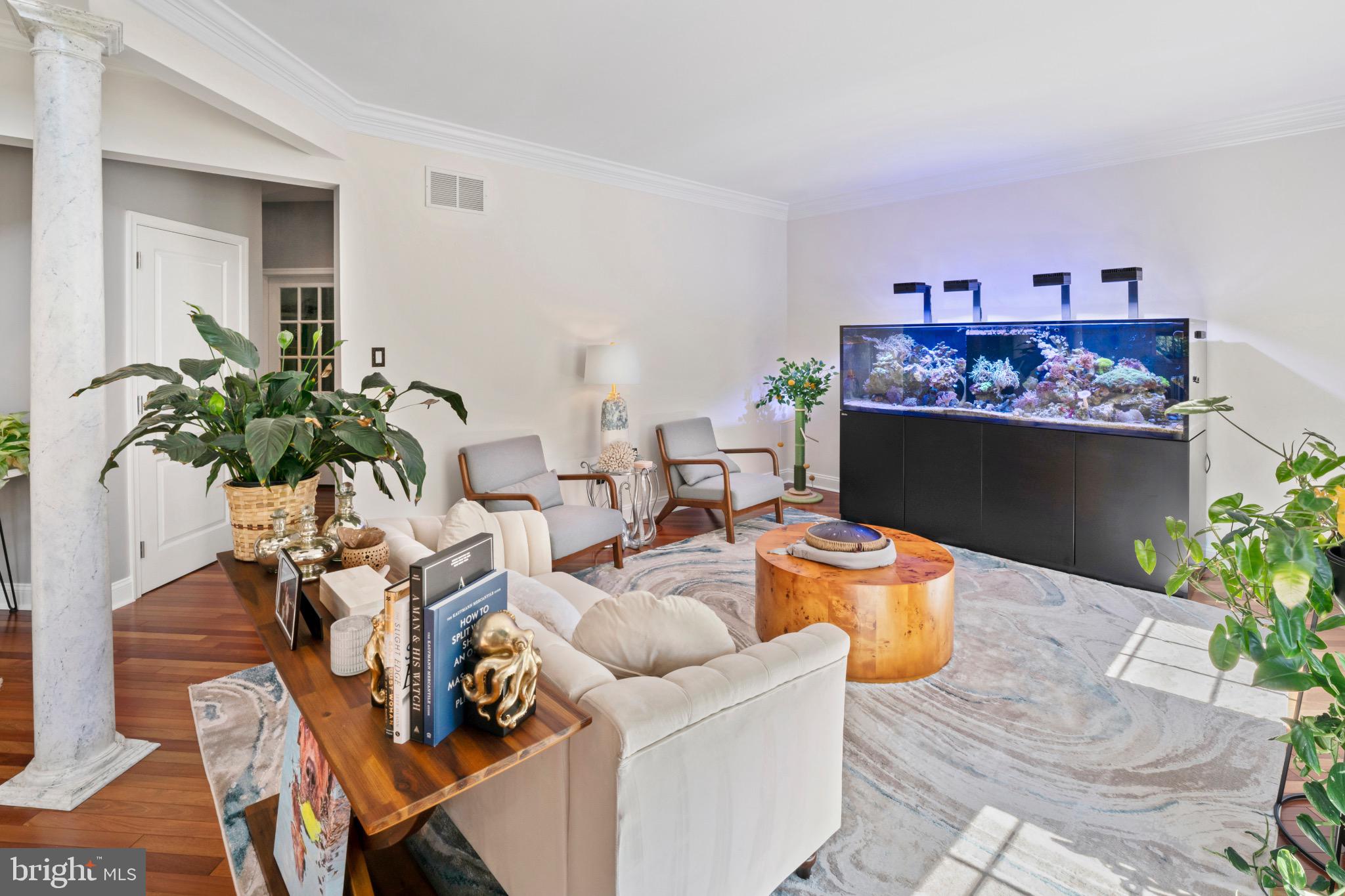 23 Regal's Court Swedesboro, NJ 08085 - Photo 27 of 74 a living room with furniture a fireplace and a potted plant