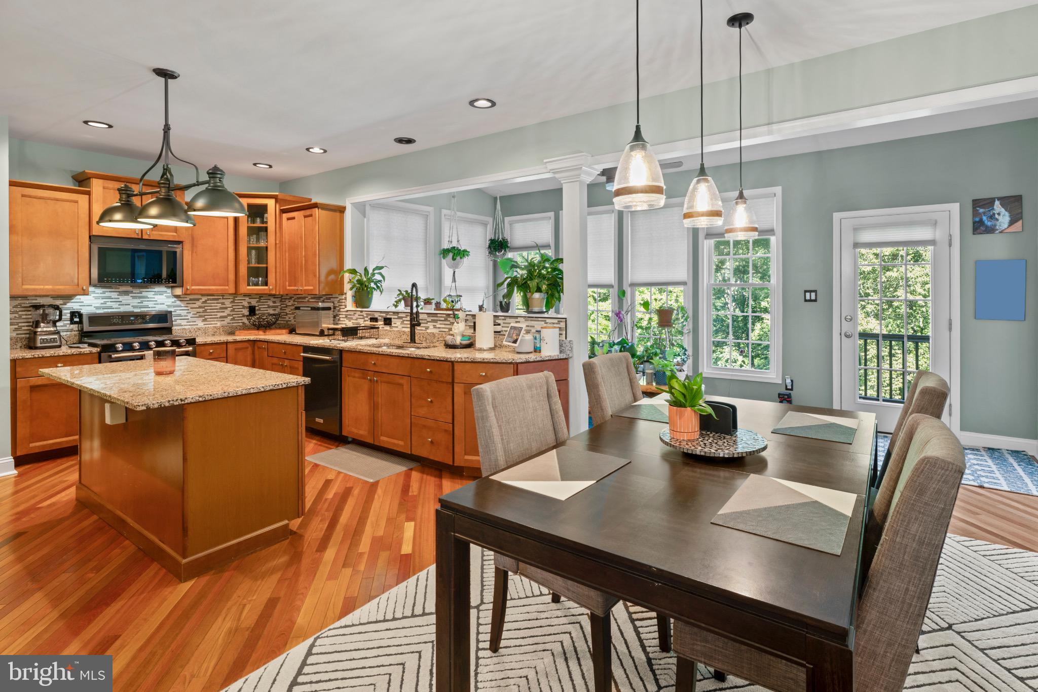 23 Regal's Court Swedesboro, NJ 08085 - Photo 36 of 74 a kitchen with sink table and chairs