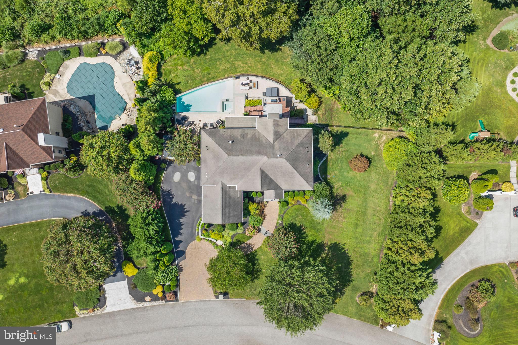 23 Regal's Court Swedesboro, NJ 08085 - Photo 4 of 74 an aerial view of a house with a yard and large trees