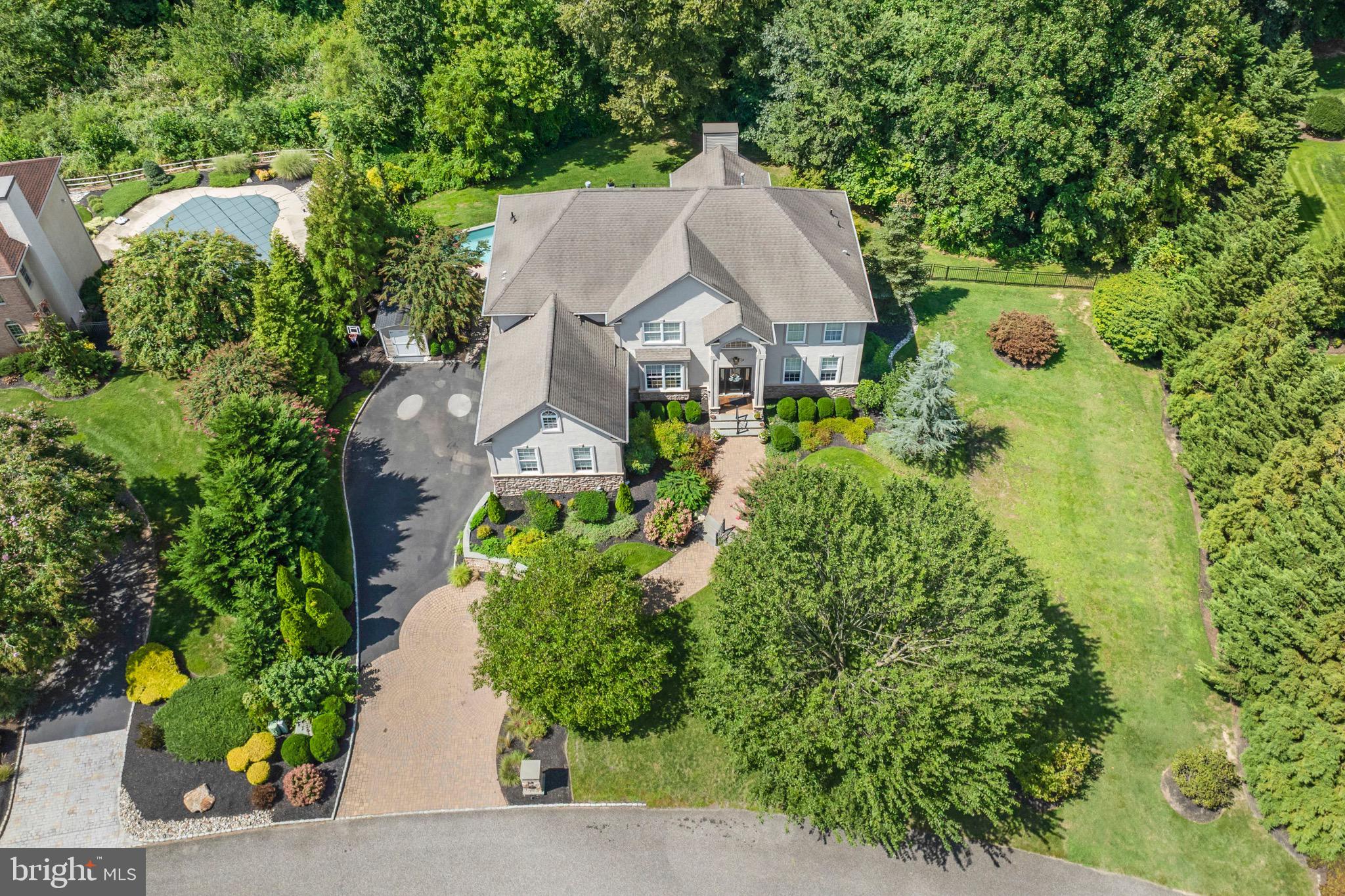 23 Regal's Court Swedesboro, NJ 08085 - Photo 5 of 74 an aerial view of a house with swimming pool and garden