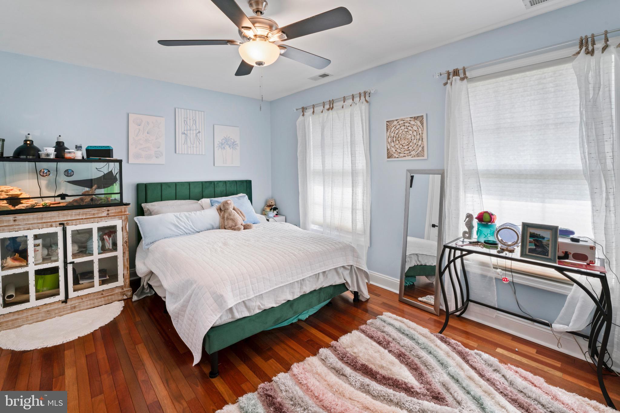 23 Regal's Court Swedesboro, NJ 08085 - Photo 52 of 74 a bedroom with a bed and wooden floor