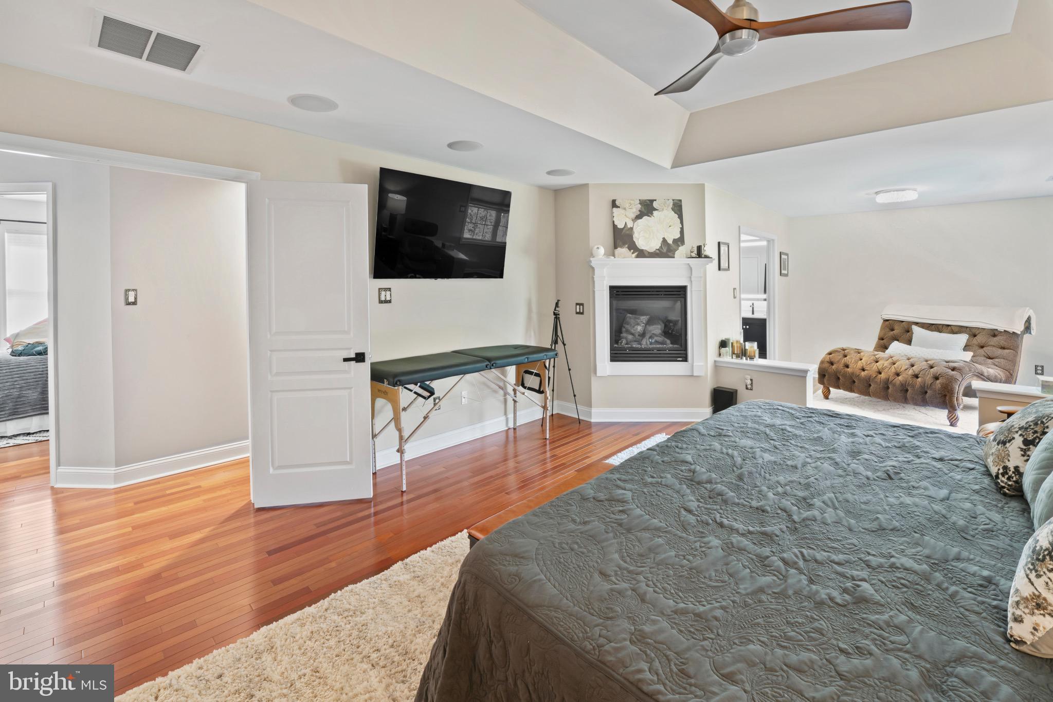 23 Regal's Court Swedesboro, NJ 08085 - Photo 58 of 74 a living room with fireplace furniture and a flat screen tv