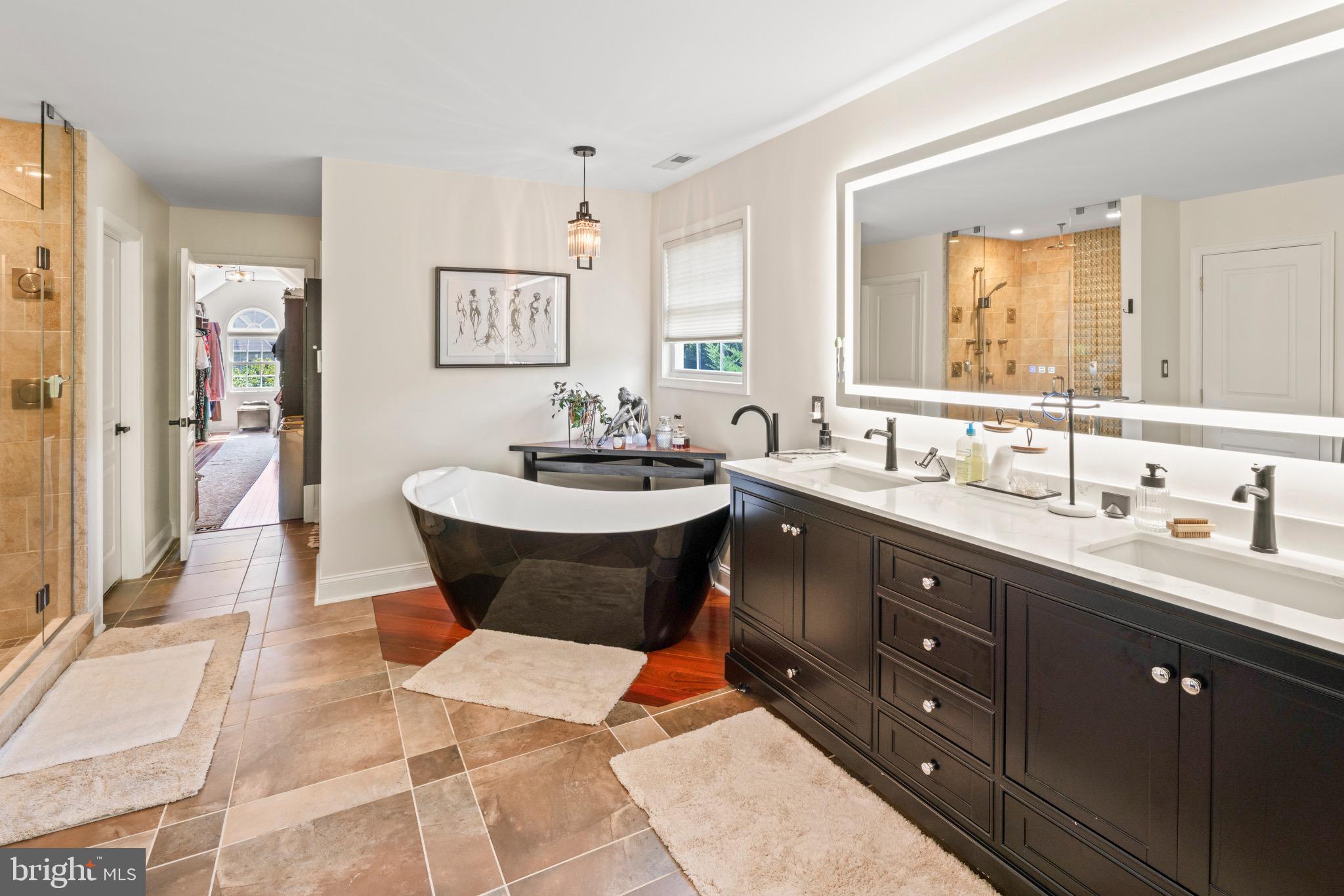 23 Regal's Court Swedesboro, NJ 08085 - Photo 59 of 74 a spacious bathroom with a sink double vanity and a mirror