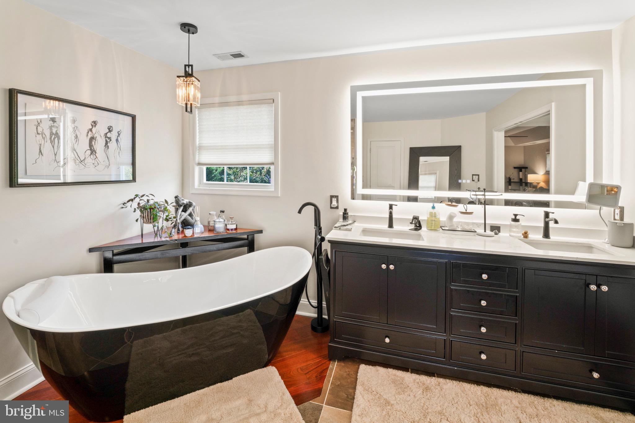 23 Regal's Court Swedesboro, NJ 08085 - Photo 61 of 74 a bathroom with a sink double vanity and a mirror