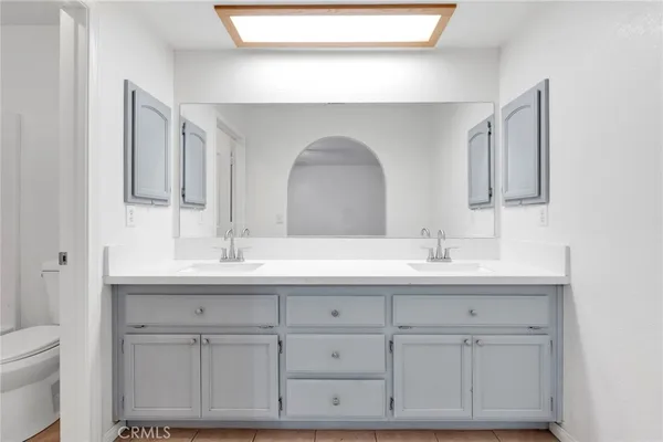 a bathroom with a sink and a toilet