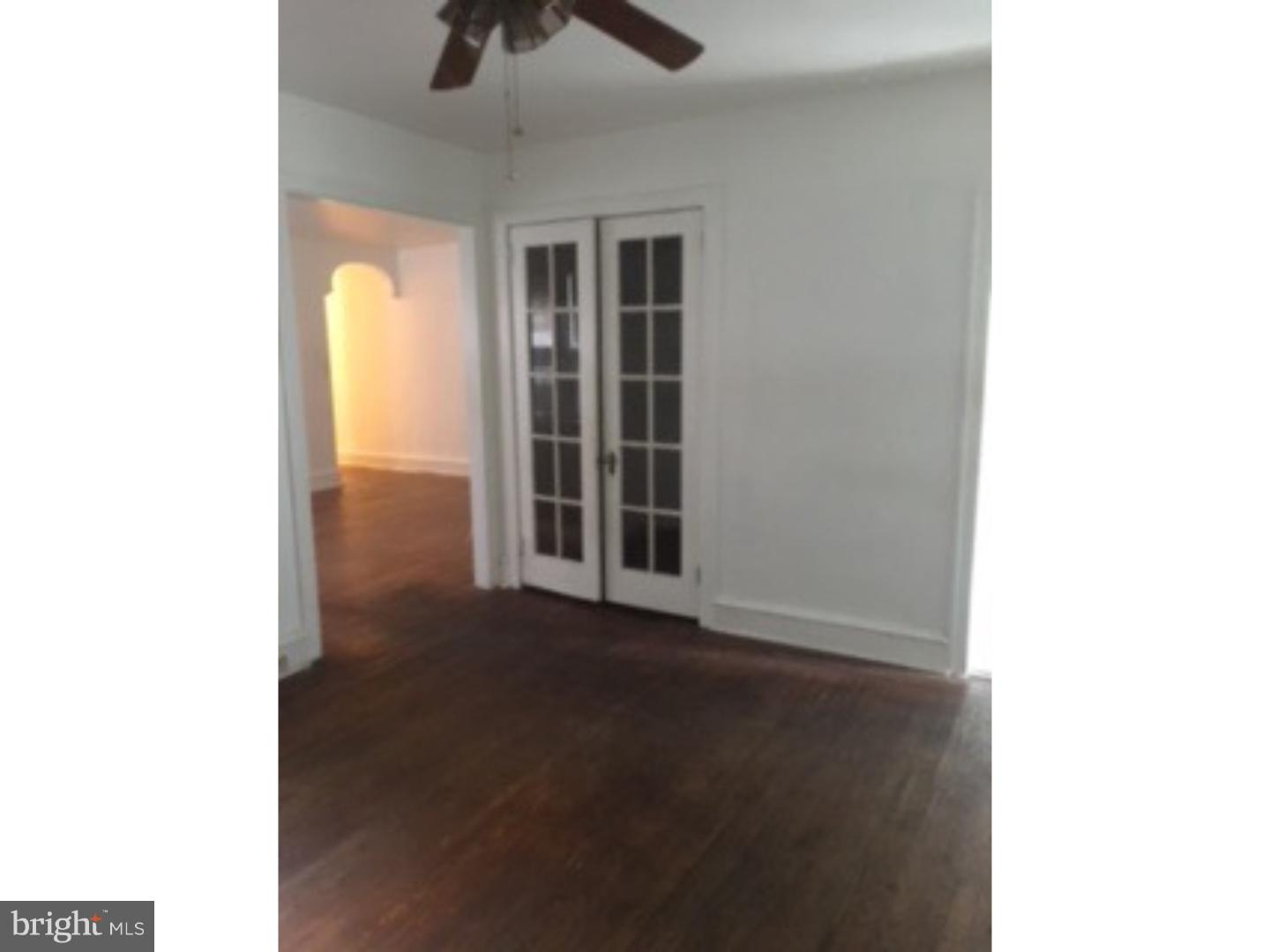 6138 Wayne Avenue, Unit 2 Philadelphia, PA 19144 - Photo 3 of 11 a bathroom with a black gate