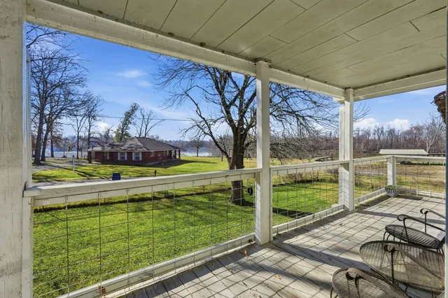 a view of a house with a big yard