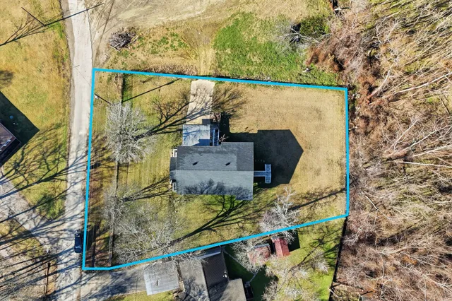 a view of a swimming pool with outdoor seating