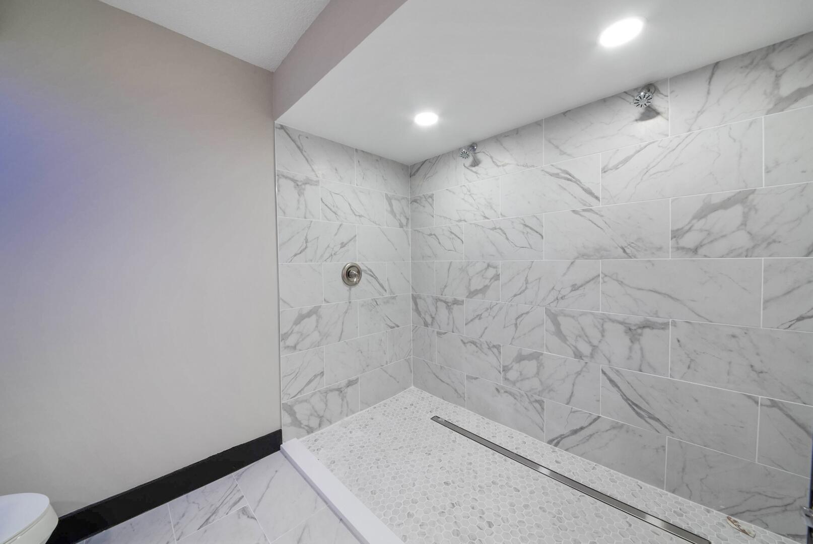 8658 Kimble Way Boca Raton, FL 33433 - Photo 17 of 33 a bathroom with a bathtub