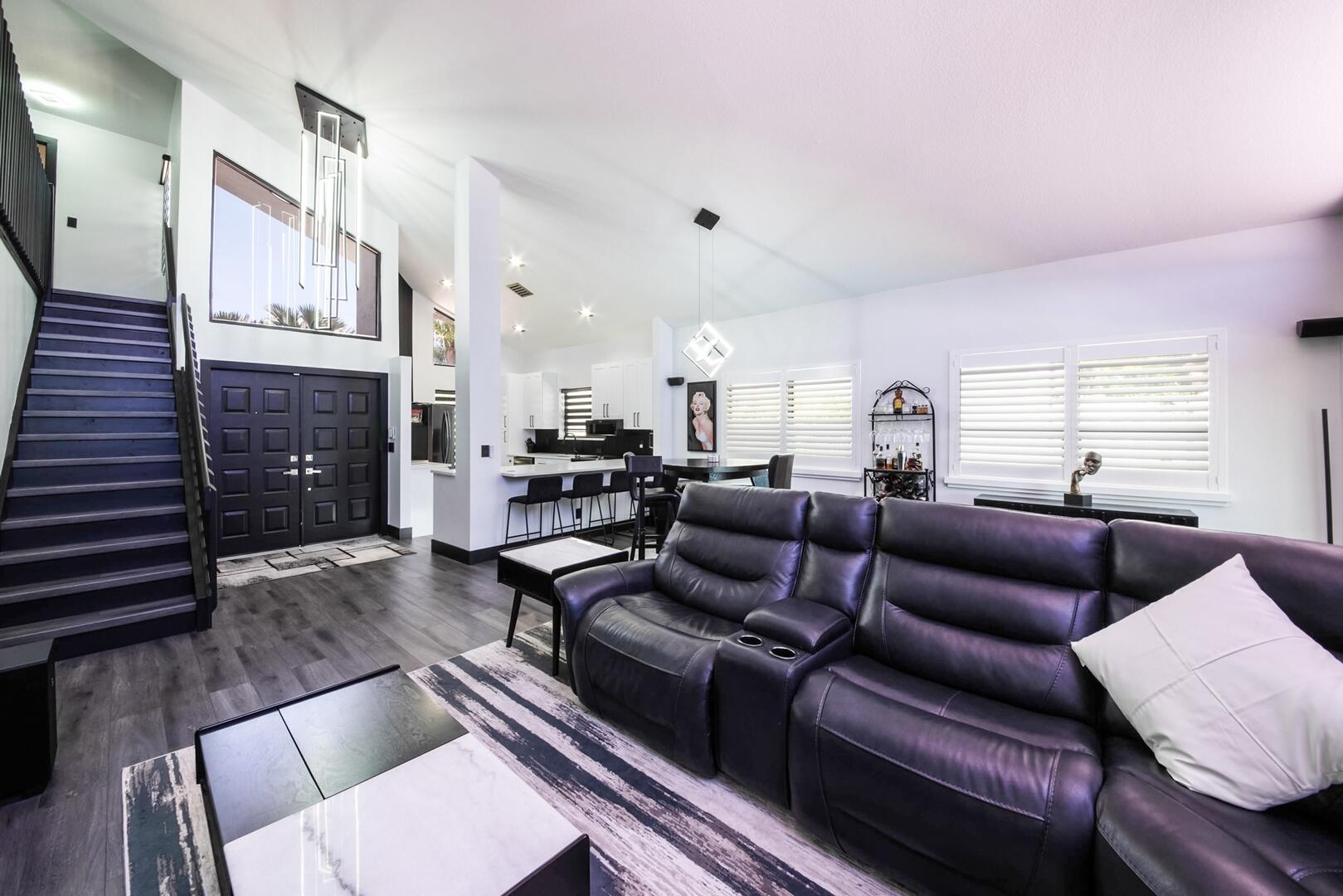 8658 Kimble Way Boca Raton, FL 33433 - Photo 2 of 33 a living room with furniture kitchen view and a fireplace