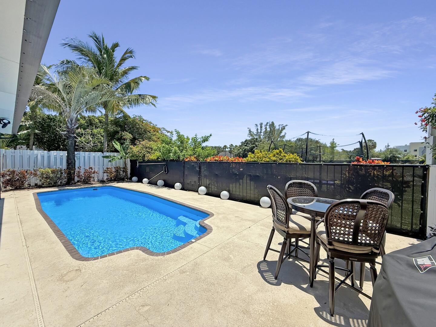 8658 Kimble Way Boca Raton, FL 33433 - Photo 21 of 33 a view of a chairs and table in patio