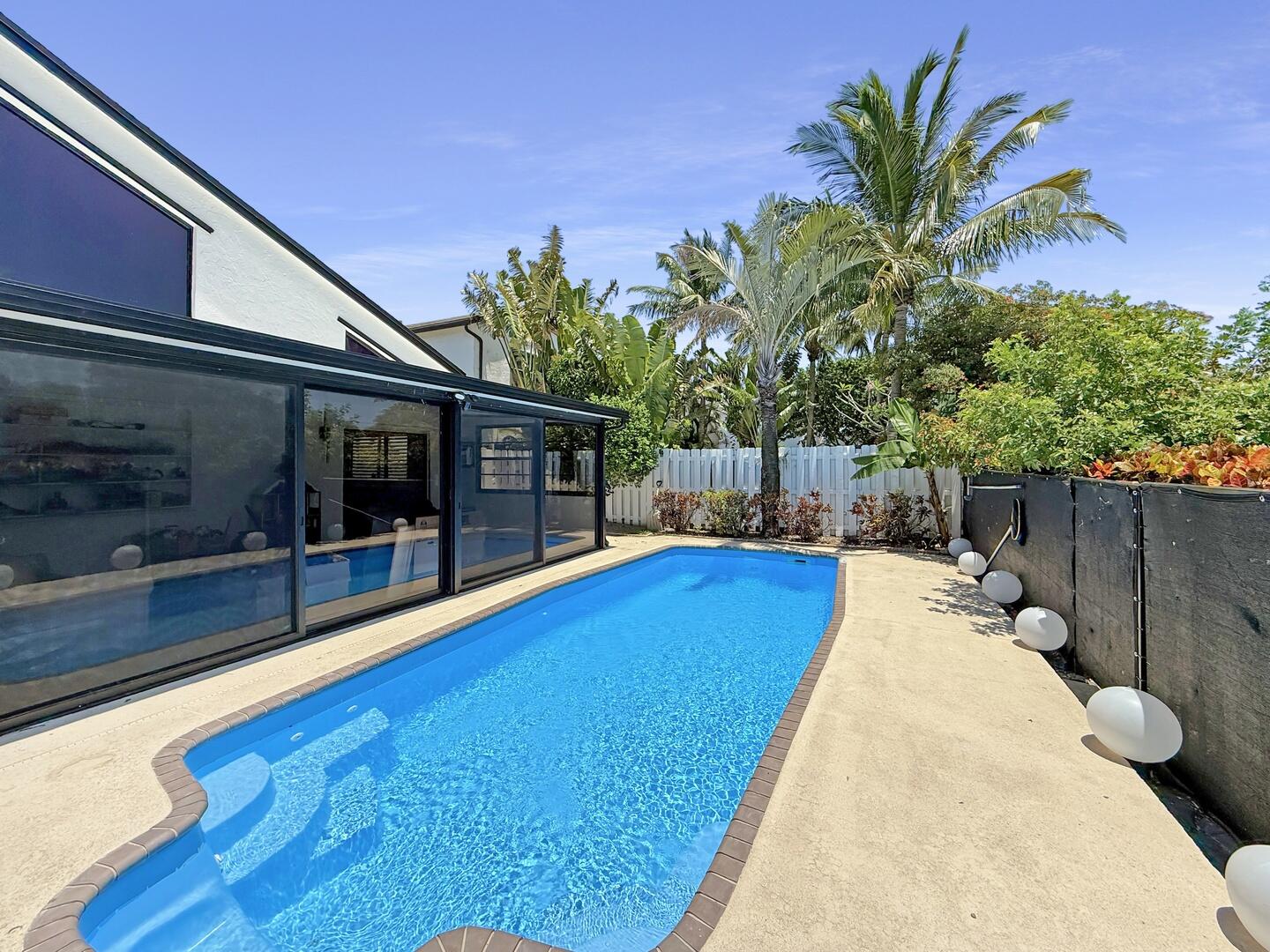 8658 Kimble Way Boca Raton, FL 33433 - Photo 25 of 33 a view of a house with swimming pool