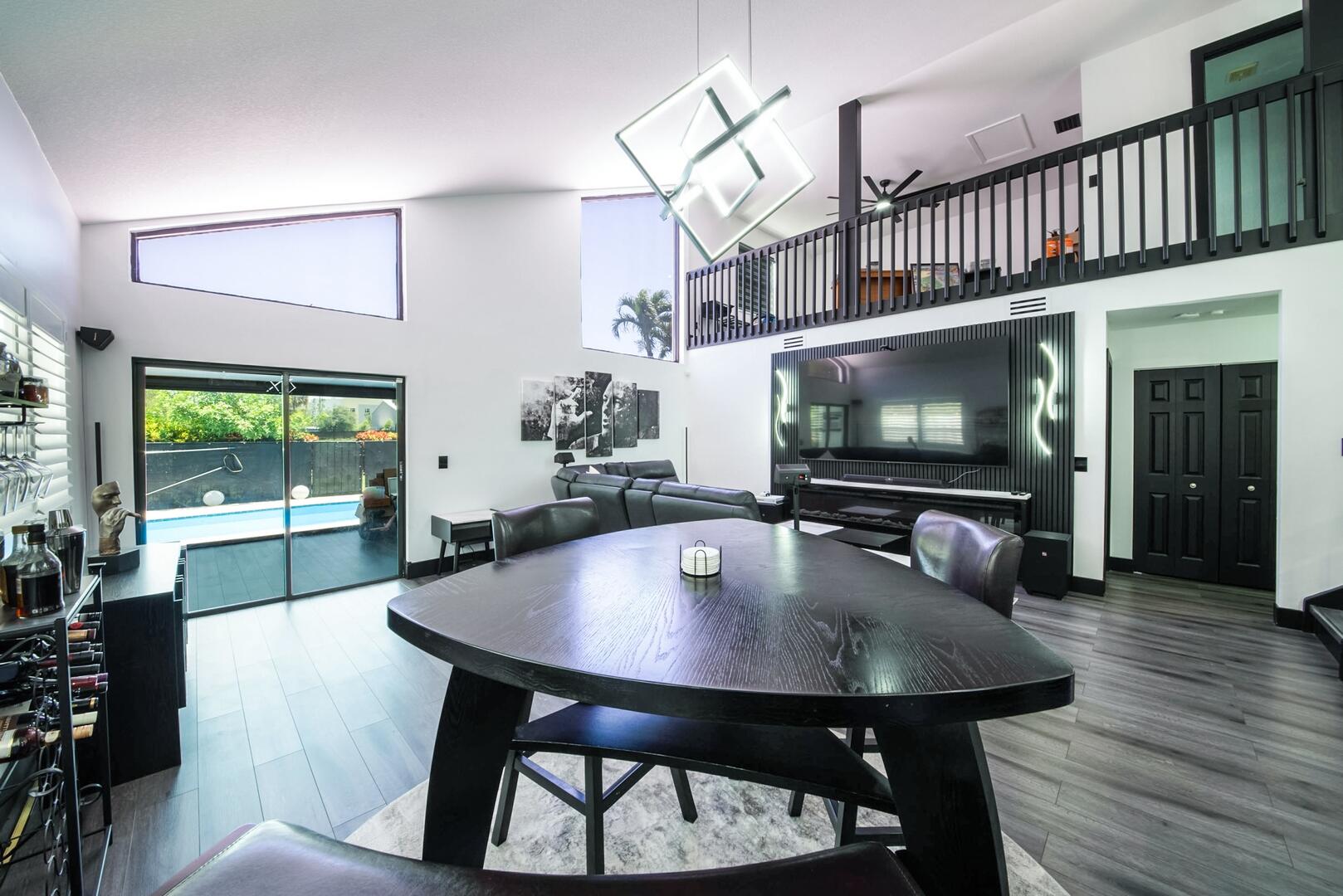 8658 Kimble Way Boca Raton, FL 33433 - Photo 5 of 33 a dining room with furniture and a floor to ceiling window