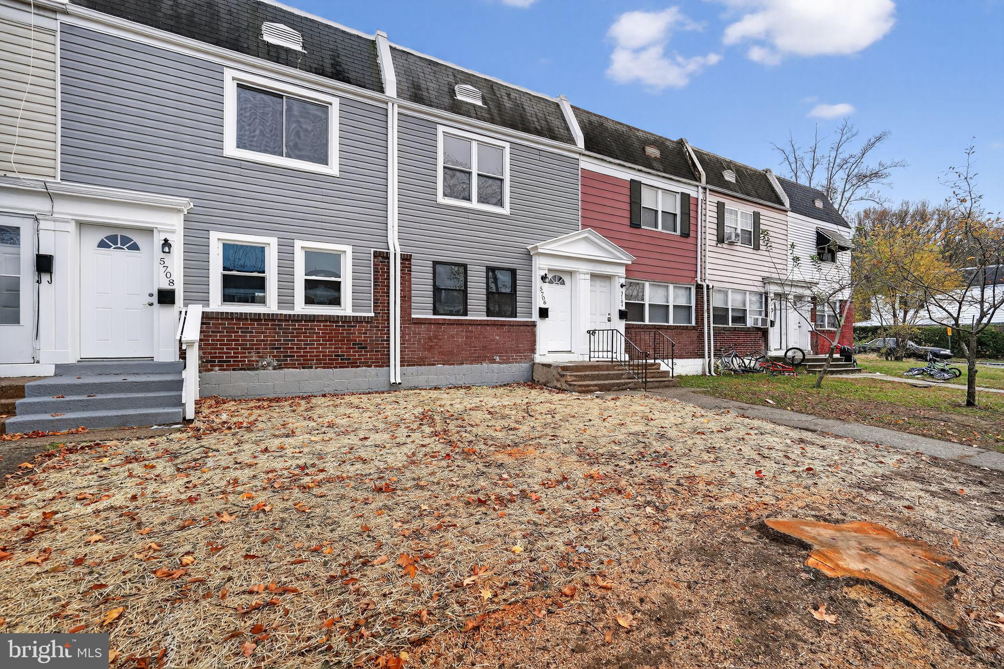 5706 Mitchell Road Levittown, PA 19057 - Photo 18 of 19 a front view of a house with a yard