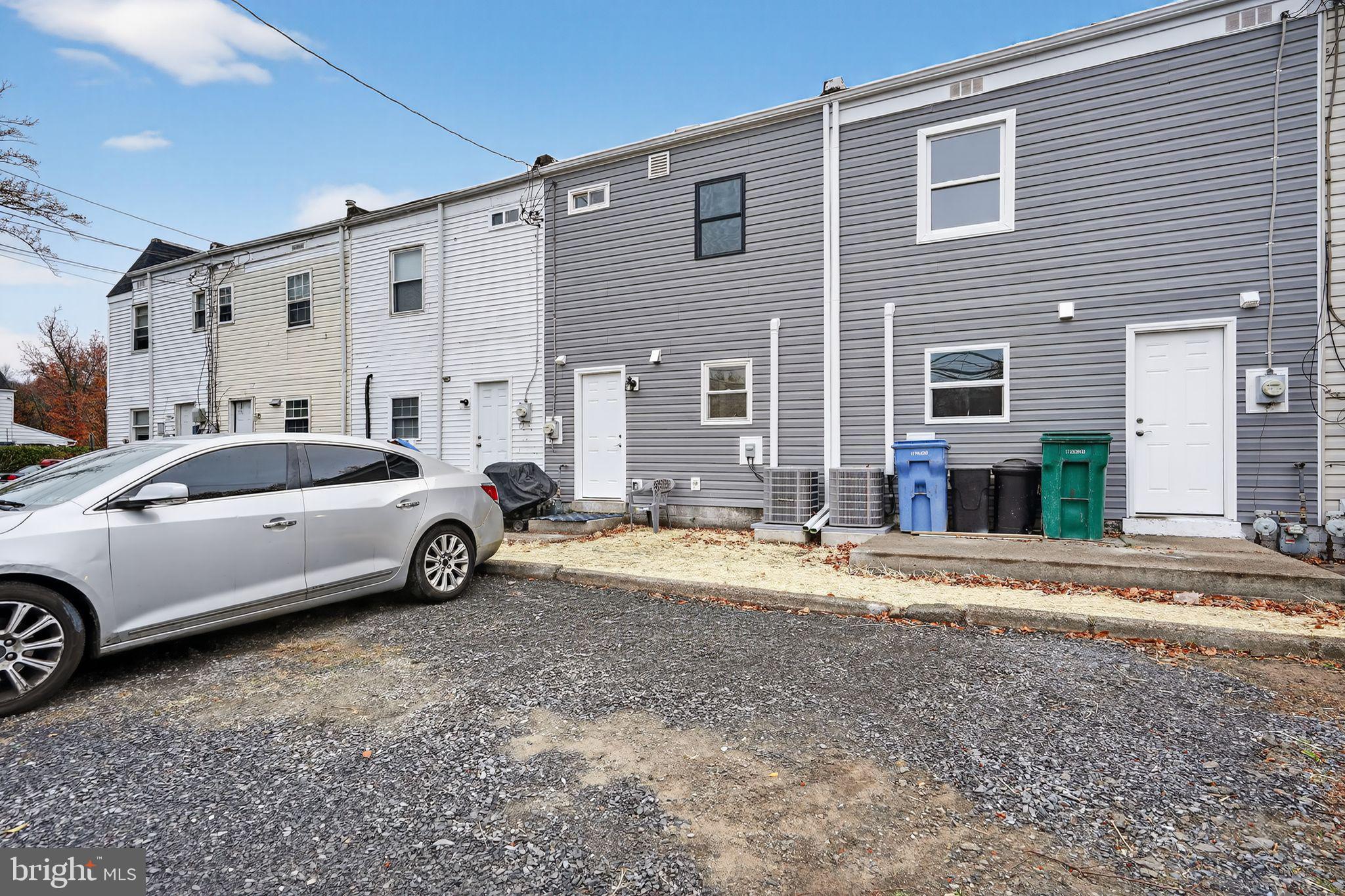 5706 Mitchell Road Levittown, PA 19057 - Photo 19 of 19 a view of a car parked in front of a house