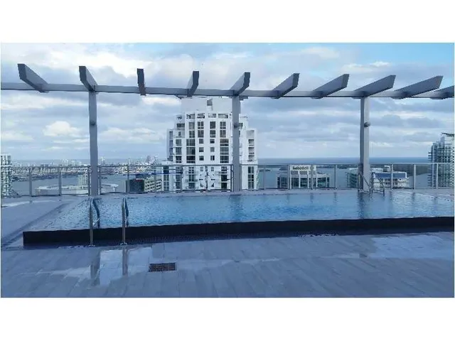 a black and white photo of a living room