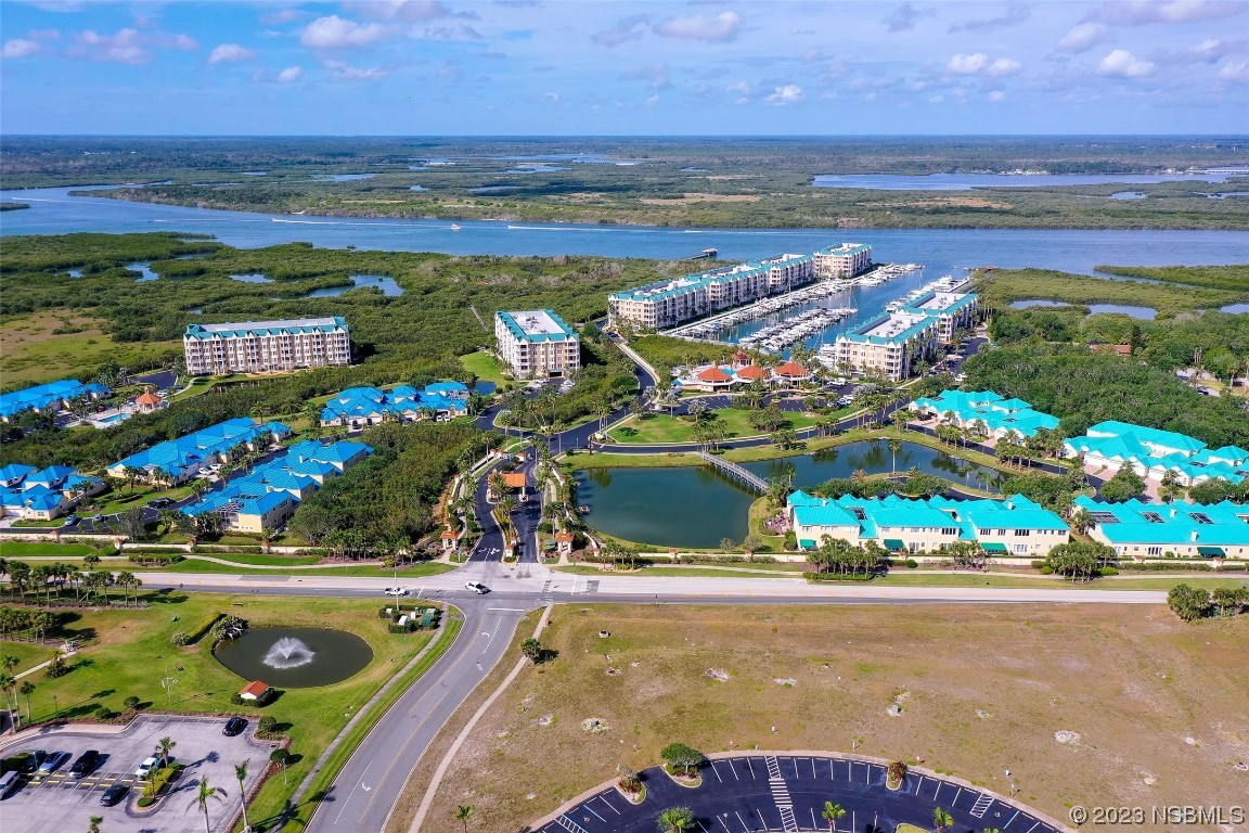 4620 Riverwalk Village Court, Unit 7206 Ponce Inlet, FL 32127 - Photo 22 of 48 a view of an outdoor space