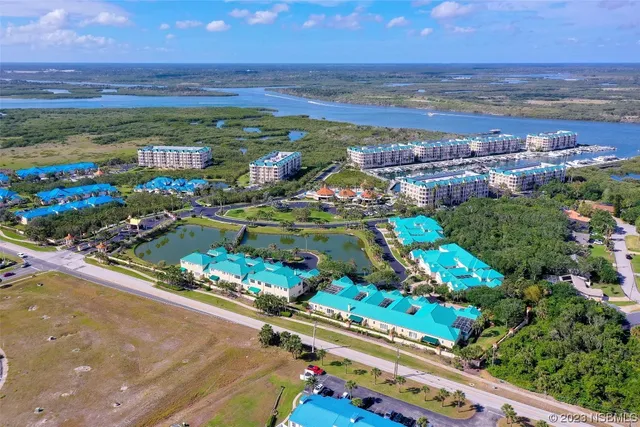 a view of a city with an ocean