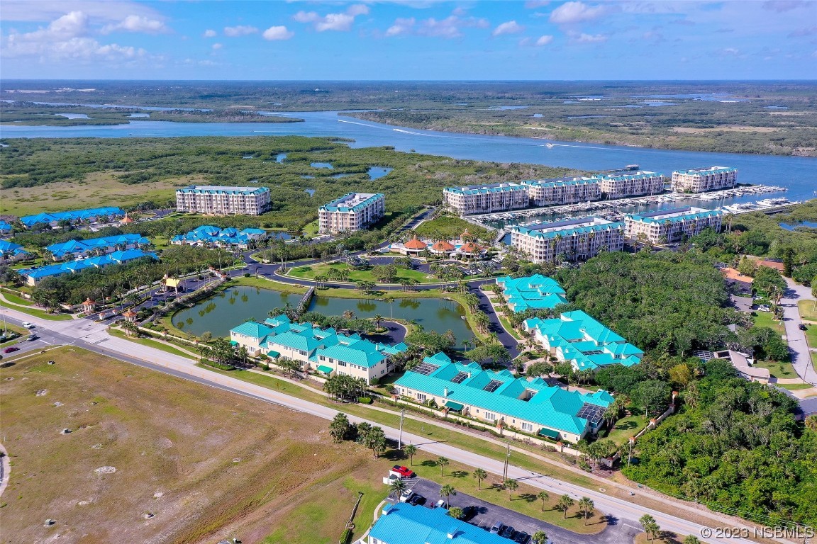 4620 Riverwalk Village Court, Unit 7206 Ponce Inlet, FL 32127 - Photo 23 of 48 a view of a city with an ocean