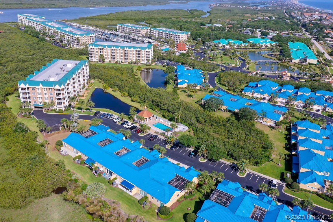 4620 Riverwalk Village Court, Unit 7206 Ponce Inlet, FL 32127 - Photo 27 of 48 aerial view of a city