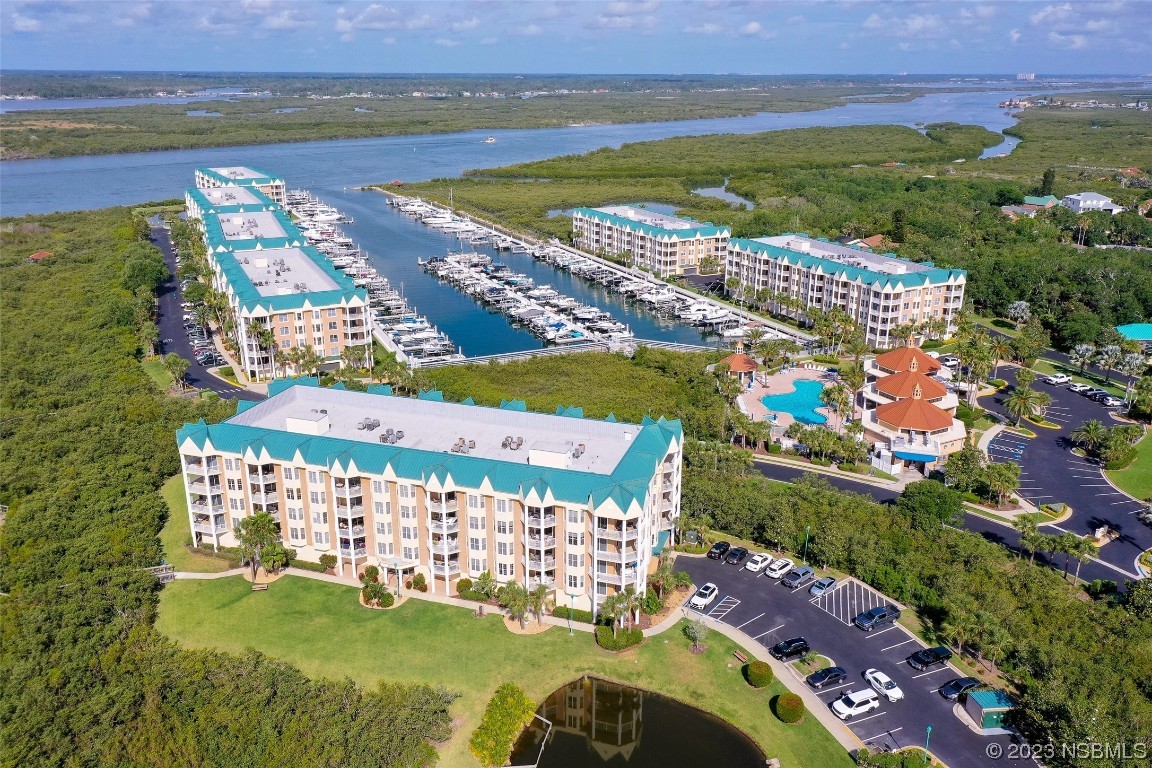 4620 Riverwalk Village Court, Unit 7206 Ponce Inlet, FL 32127 - Photo 30 of 48 a view of a city with an ocean view