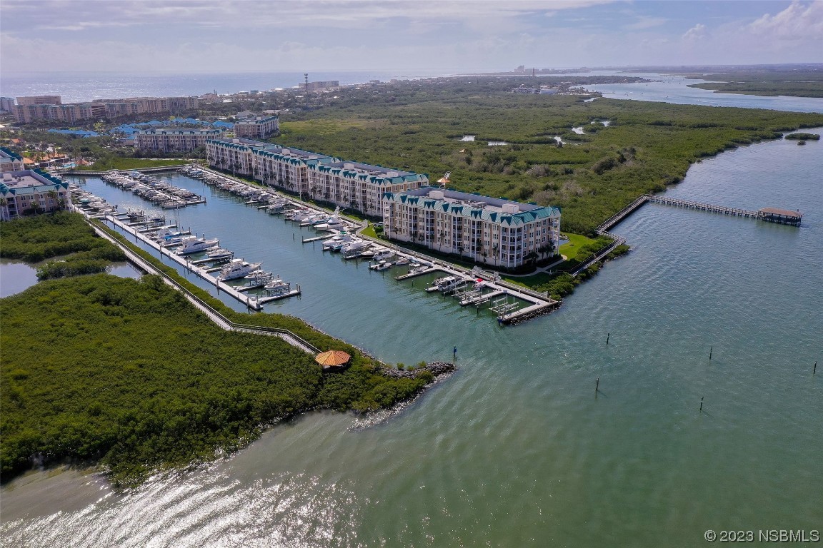 4620 Riverwalk Village Court, Unit 7206 Ponce Inlet, FL 32127 - Photo 32 of 48 an aerial view of a house