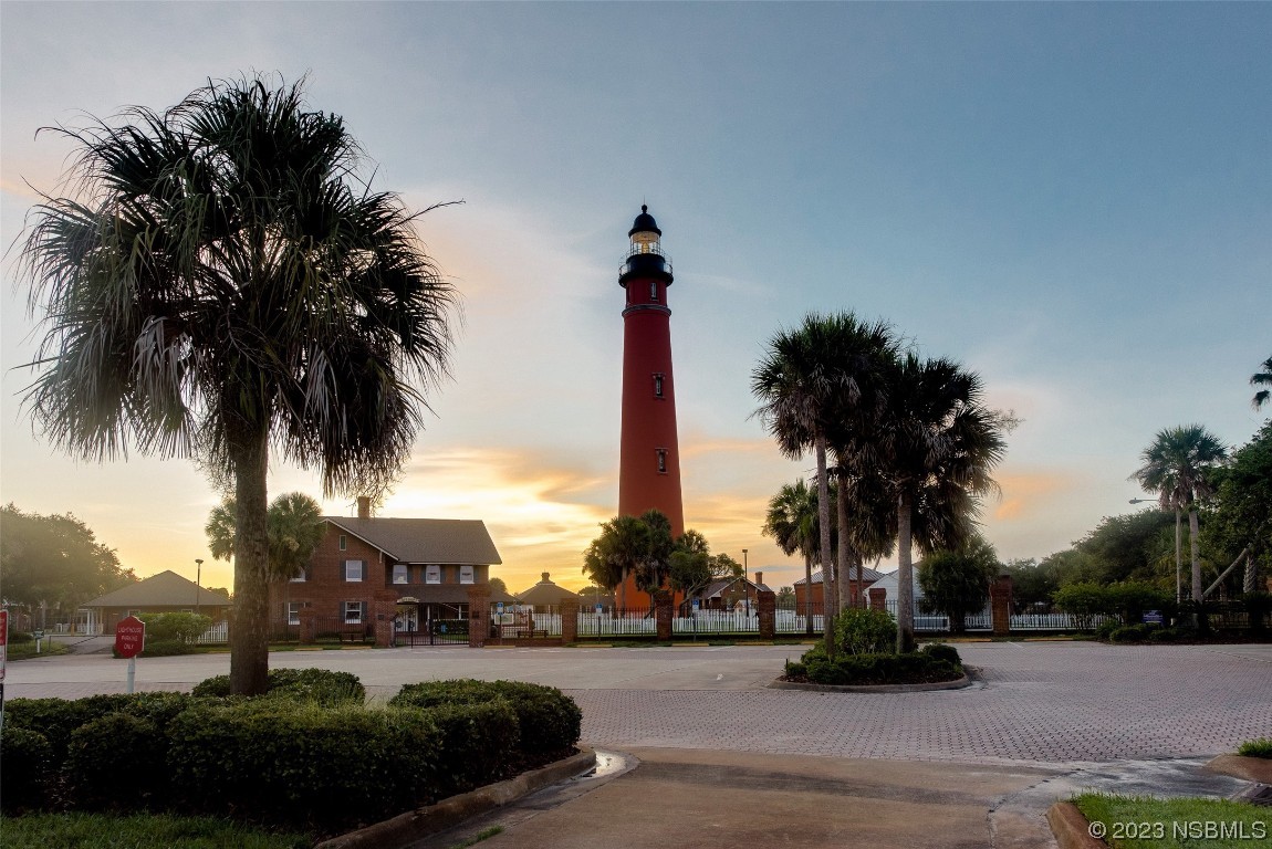 4620 Riverwalk Village Court, Unit 7206 Ponce Inlet, FL 32127 - Photo 38 of 48 a view of a street with palm trees