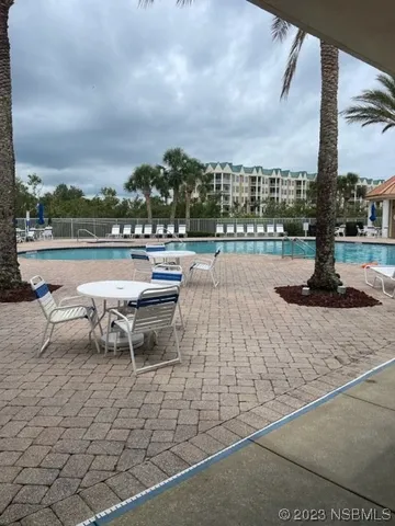 a sign that is sitting in front of a house