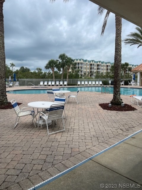 4620 Riverwalk Village Court, Unit 7206 Ponce Inlet, FL 32127 - Photo 44 of 48 a view of a terrace with furniture